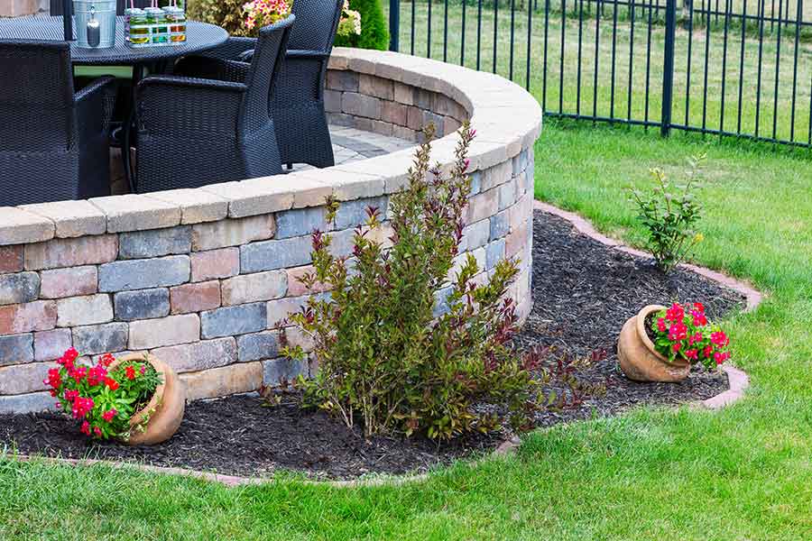 Rustic brick retaining garden wall